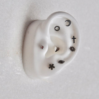 Boucle d'oreille mini étoile-écrou